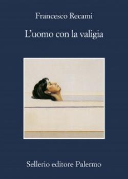 L'UOMO CON LA VALIGIA